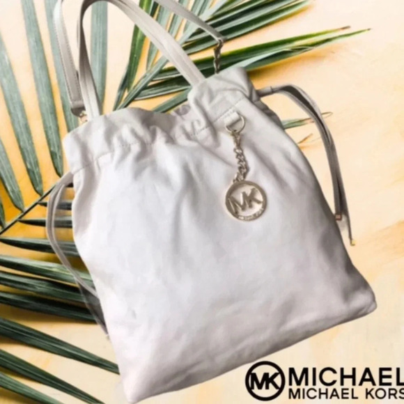 Michael Kors Handbags - Michael Kors Cream cinch sides soft pebbled buttery leather white tote bag purse